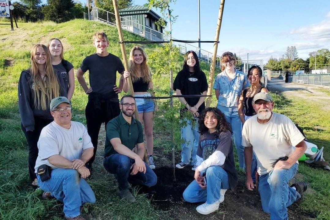 The 3rd tree is planted . . . time for a group photo!